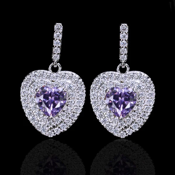 boucle d'oreille coeur blanc